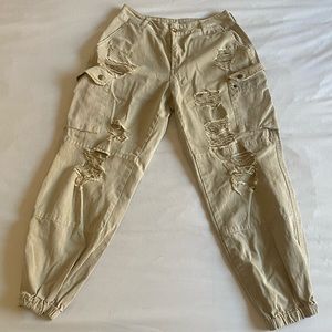 beige nude tan ripped cargo pants